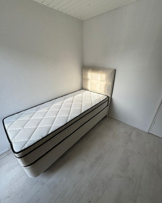 Crown een persoons bed boxspring 90cm x 200cm. - kleur licht crème